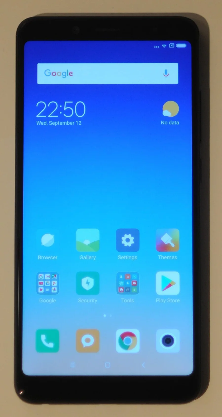 Смартфон Xiaomi Redmi с иконками приложений