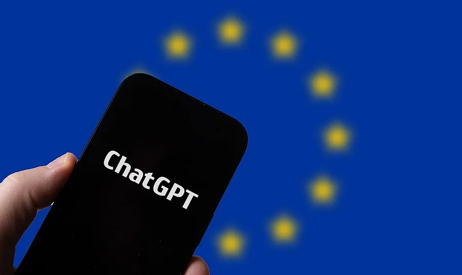 Смартфон с ChatGPT на фоне флага Евросоюза